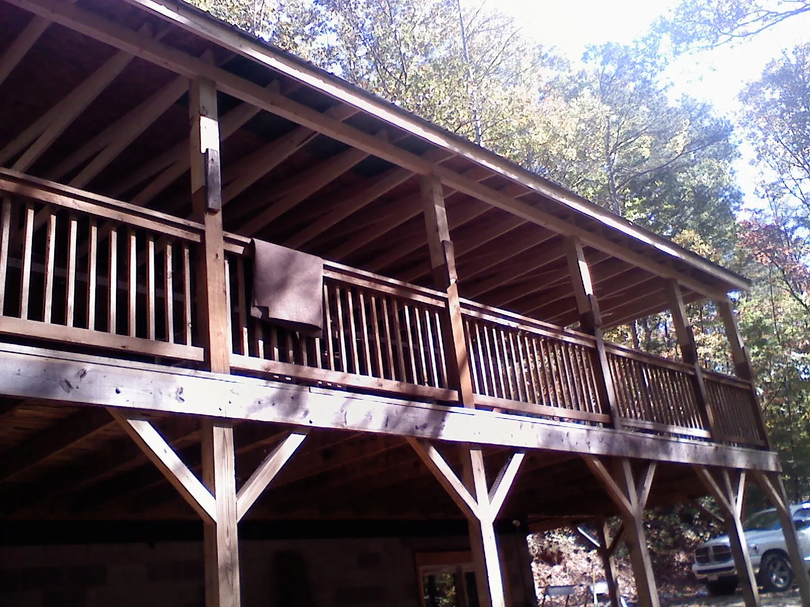 Timber framing under a new elevated porch and deck — Roof Leak Repair in Fresh Meadows by Roofing Brothers